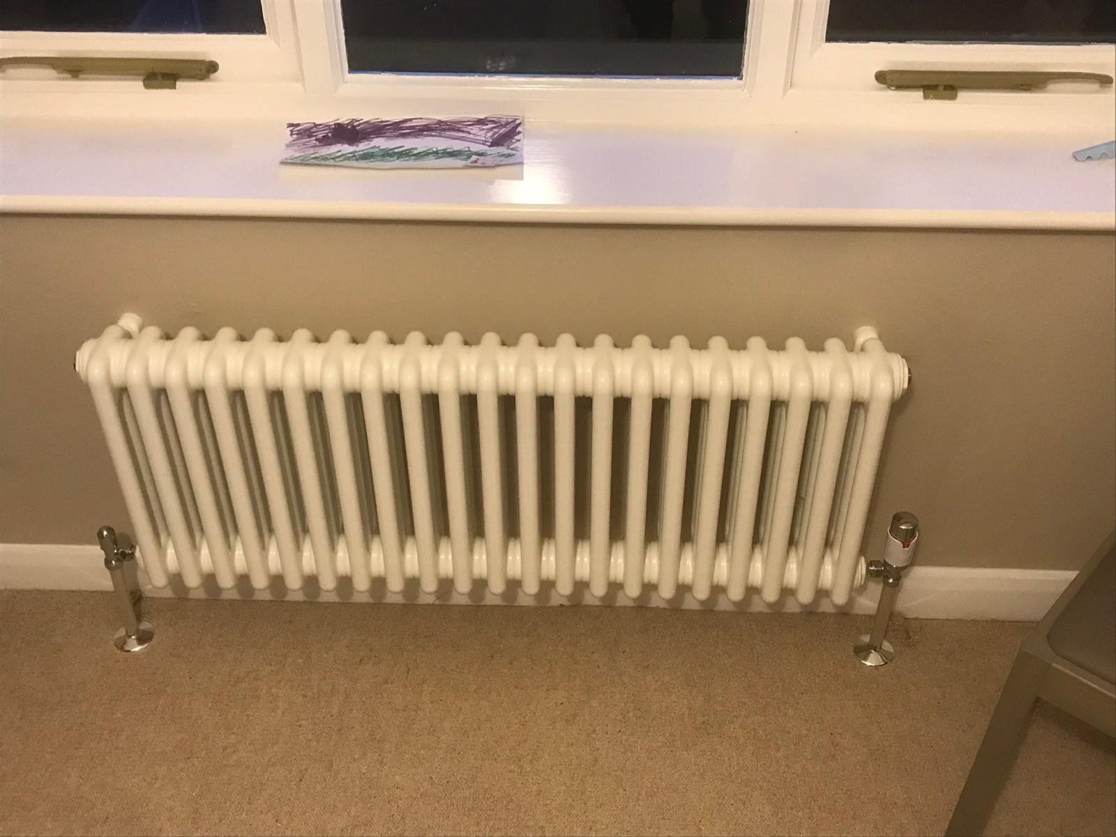 Curved chrome towel radiator